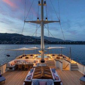Aerial view at night of the NERO Yacht upper deck.