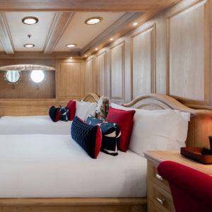 Side view of two twin beds in the NERO Yacht.